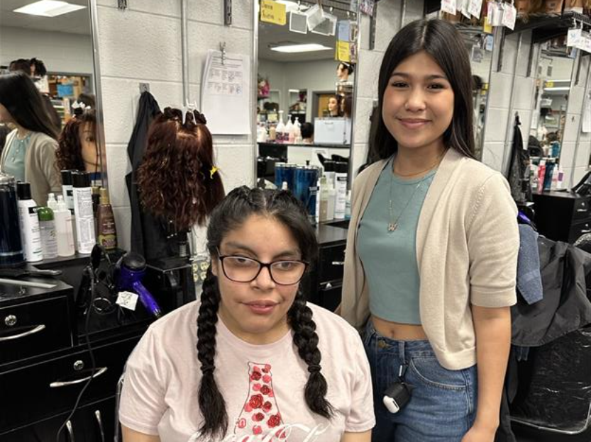 Centennial High cosmetology students style hair